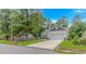 A charming home with a two car garage, long driveway, and small garden bed at 3539 Harrelson Ave., Loris, SC 29569
