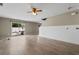Open living room with backyard access and shiplap accent wall at 4013 Blackwolf Dr., Myrtle Beach, SC 29579