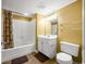 Bathroom with a tub and shower combination and a white vanity with sink and toilet at 4103 N Ocean Blvd. N # 204, North Myrtle Beach, SC 29582