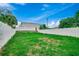 Spacious backyard with a tall privacy fence, perfect for outdoor activities and relaxation at 422 South Poplar Dr., Surfside Beach, SC 29575