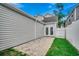 Paver patio in the backyard provides a cozy outdoor space for relaxation and entertaining at 422 South Poplar Dr., Surfside Beach, SC 29575