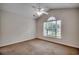 Carpeted bedroom offering a vaulted ceiling and large windows at 422 South Poplar Dr., Surfside Beach, SC 29575