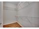 Walk-in closet with wire shelving and wood-look flooring at 422 South Poplar Dr., Surfside Beach, SC 29575