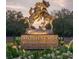 Brookgreen Gardens features a bronze sculpture of horses and landscaping at 4319 Lotus Ct. # A, Murrells Inlet, SC 29576