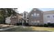 A charming two-story townhome with a manicured lawn and beautiful landscaping at 4319 Lotus Ct. # A, Murrells Inlet, SC 29576