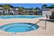 Community hot tub and pool with lounge chairs at 4319 Lotus Ct. # A, Murrells Inlet, SC 29576