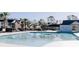 Relaxing pool area with palm trees in a community at 4319 Lotus Ct. # A, Murrells Inlet, SC 29576
