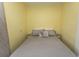 This bedroom features a comfortable bed with a patterned grey comforter and decorative pillows at 4516 Seaview St. # 137, North Myrtle Beach, SC 29582