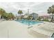 A refreshing pool surrounded by lounge chairs and lush palm trees, perfect for relaxation at 4516 Seaview St. # 137, North Myrtle Beach, SC 29582