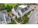 Aerial view of a two-story condominium featuring well-maintained landscaping and a private entrance at 4574 Girvan Dr. # D, Myrtle Beach, SC 29579