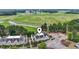 Aerial view of the community featuring mature trees, pond and golf course views at 4574 Girvan Dr. # D, Myrtle Beach, SC 29579