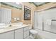Bathroom featuring a vanity, toilet, mirror, and shower-tub combination at 4574 Girvan Dr. # D, Myrtle Beach, SC 29579