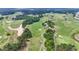 Aerial view of the expansive golf course with lush green fairways and mature trees at 4574 Girvan Dr. # D, Myrtle Beach, SC 29579