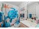 Charming bathroom with a seashell wallpaper, a starfish shower curtain, and a turtle toilet seat at 4648 Greenbriar Dr. # D2, Little River, SC 29566