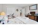 Cozy bedroom featuring an inviting full-sized bed, view into the hall, and comfortable furnishings at 4648 Greenbriar Dr. # D2, Little River, SC 29566