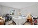 Neutral bedroom featuring light gray walls, white wood flooring, and comfortable looking full-sized bed at 4648 Greenbriar Dr. # D2, Little River, SC 29566