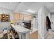 Bright kitchen featuring light wood cabinetry, white appliances and plenty of counter space at 4648 Greenbriar Dr. # D2, Little River, SC 29566