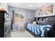 Stylish bedroom with dark furniture, a beachy art theme, and a ceiling fan at 502 Garden Dr., Surfside Beach, SC 29575
