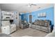 Bright living room featuring stylish furniture and an open view of the kitchen at 502 Garden Dr., Surfside Beach, SC 29575