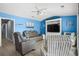 Living room space featuring modern furniture and light blue walls at 502 Garden Dr., Surfside Beach, SC 29575