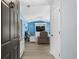 Inviting living room with a modern beachy theme, light blue walls, and open layout at 502 Garden Dr., Surfside Beach, SC 29575