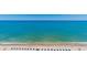 Aerial view of beach featuring blue umbrellas, white sand, and light blue ocean at 504 N Ocean Blvd. # 1804 A/B, Myrtle Beach, SC 29577