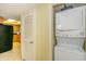 Laundry area with a stackable washer and dryer unit, located near the kitchen at 504 N Ocean Blvd. # 1804 A/B, Myrtle Beach, SC 29577