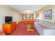 Living room featuring a sofa, table, and dining area at 504 N Ocean Blvd. # 1804 A/B, Myrtle Beach, SC 29577