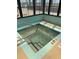 Indoor hot tub with railings and tiling at 523 S Ocean Blvd. # 705, North Myrtle Beach, SC 29582