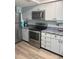 Well-equipped kitchen featuring stainless steel appliances and granite countertops at 523 S Ocean Blvd. # 705, North Myrtle Beach, SC 29582