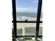 Breathtaking ocean view from a window, complete with beach decor at 523 S Ocean Blvd. # 705, North Myrtle Beach, SC 29582