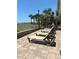 Resort pool deck features multiple lounge chairs overlooking manicured landscaping and stunning ocean views at 523 S Ocean Blvd. # 705, North Myrtle Beach, SC 29582