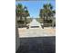 Charming walkway lined with palm trees leads to the beach; perfect for a relaxing stroll at 523 S Ocean Blvd. # 705, North Myrtle Beach, SC 29582