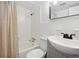 Bathroom featuring a shower-tub combination, toilet, and sink with dark matte finish faucet at 5409 North Ocean Blvd. # 106/7108, North Myrtle Beach, SC 29582