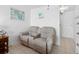 Living area featuring a plush reclining loveseat at 5409 North Ocean Blvd. # 106/7108, North Myrtle Beach, SC 29582