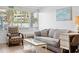 Inviting living room with comfortable seating, beach artwork, and a welcoming beach vibe at 5409 North Ocean Blvd. # 106/7108, North Myrtle Beach, SC 29582