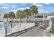 Community pool area with sun loungers, privacy fencing, and lush landscaping at 5409 North Ocean Blvd. # 106/7108, North Myrtle Beach, SC 29582