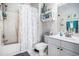Full bathroom featuring a shower-tub combo with a decorative curtain and a white vanity at 5751 Oyster Catcher Dr. # 315, North Myrtle Beach, SC 29582