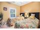 Inviting bedroom with two twin beds, decorative pillows, and a bright window at 5751 Oyster Catcher Dr. # 315, North Myrtle Beach, SC 29582