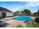 Sparkling pool with lounge chairs and shade for relaxing on sunny days at 5751 Oyster Catcher Dr. # 315, North Myrtle Beach, SC 29582