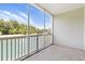 Relax on this screened-in balcony overlooking the pond with fountain and lush foliage for privacy at 5825 Catalina Dr. # 124, North Myrtle Beach, SC 29582