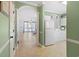 Inviting entryway featuring an archway, tiled floors, and access to a living room and kitchen at 5825 Catalina Dr. # 124, North Myrtle Beach, SC 29582