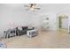 Inviting living room with tile floors open to the dining area showcasing an open floor plan at 5825 Catalina Dr. # 124, North Myrtle Beach, SC 29582