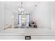 Open-concept living space featuring a dining table with tiled floors and natural light at 5825 Catalina Dr. # 124, North Myrtle Beach, SC 29582