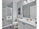 The full bathroom features a walk-in shower, single sink vanity, and neutral color scheme at 598 Blue Stem Dr. # 52E, Pawleys Island, SC 29585