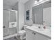 The full bathroom features a walk-in shower, single sink vanity, and neutral color scheme at 598 Blue Stem Dr. # 52E, Pawleys Island, SC 29585