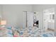 Bright bedroom with ensuite bathroom featuring beach themed decor at 6001 - 1737 S Kings Hwy., Myrtle Beach, SC 29575