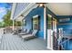 Inviting porch with comfortable lounge chairs, ceiling fans, and stylish exterior at 6001 - 1737 S Kings Hwy., Myrtle Beach, SC 29575