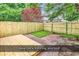 Backyard with a new deck, privacy fencing, and fresh sod, creating an inviting outdoor space at 633 Sparrow Dr. # B, Surfside Beach, SC 29575