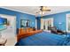 This primary bedroom boasts natural light, wooden furniture and serene ambiance at 6420 Longwood Dr., Murrells Inlet, SC 29576